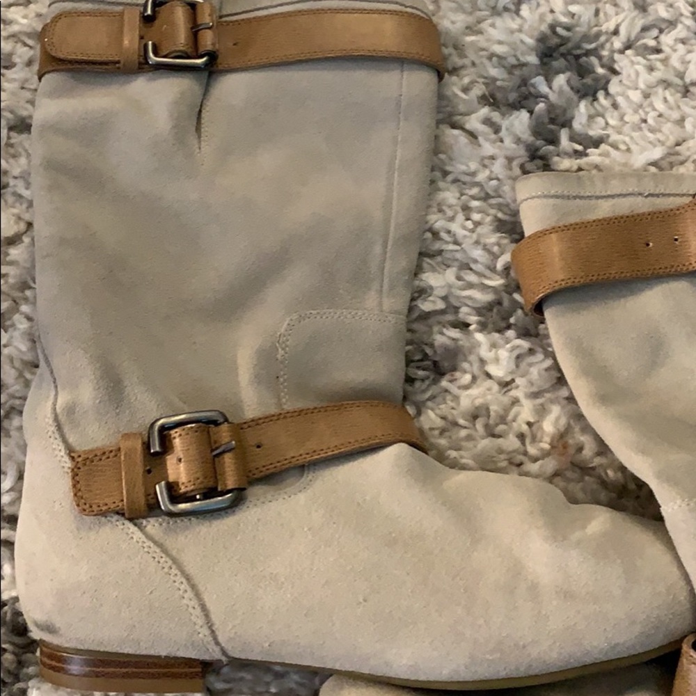 Tan and brown buckle boots